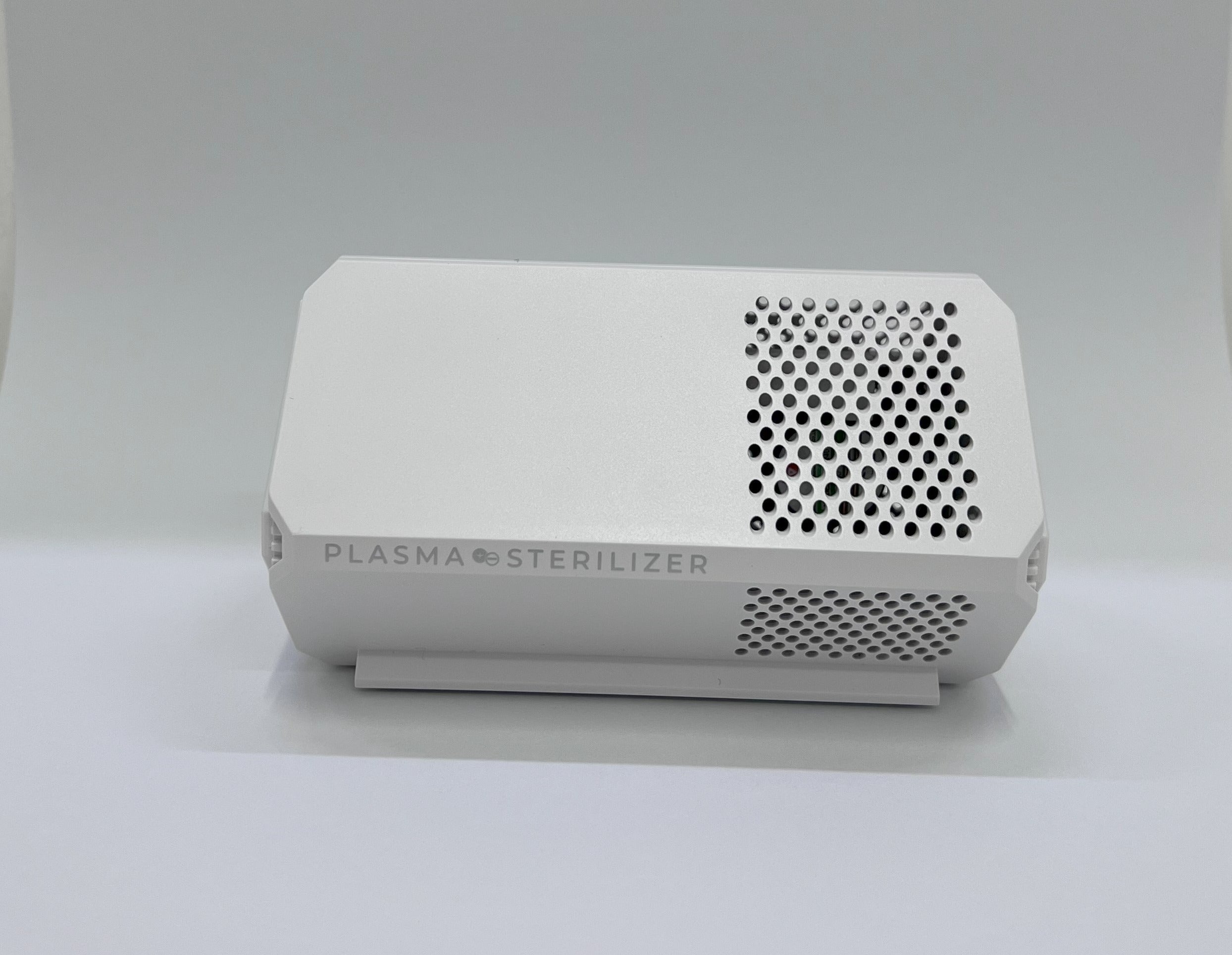 AIRE Plasma car air purifier mounted in a vehicle dashboard