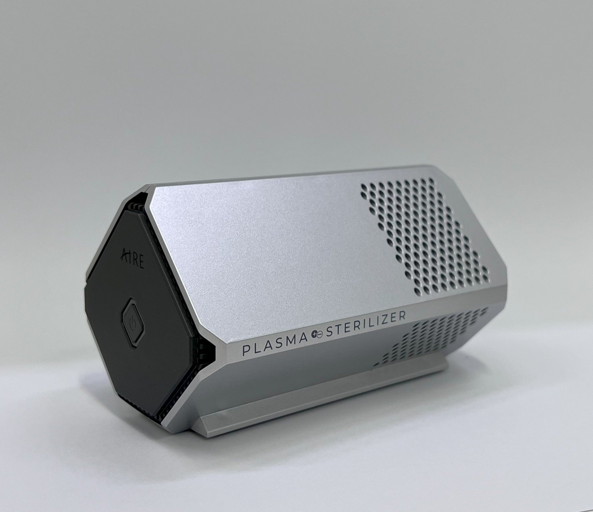 AIRE Plasma car air purifier mounted in a vehicle dashboard