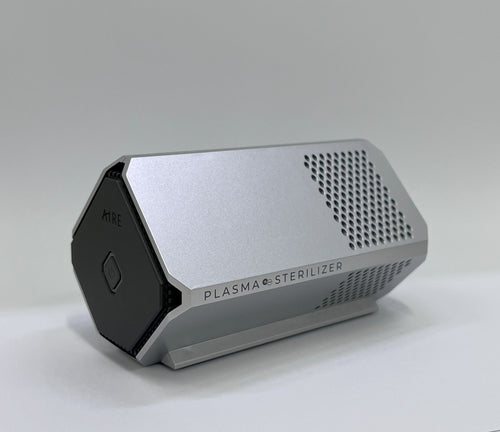 AIRE Plasma car air purifier mounted in a vehicle dashboard
